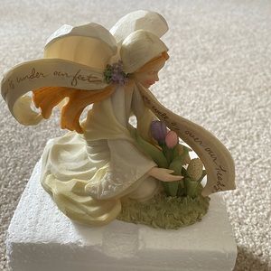 Enesco figurine. Beautiful. “Heaven Is Under Our Feet as Well as Over Our Heads”